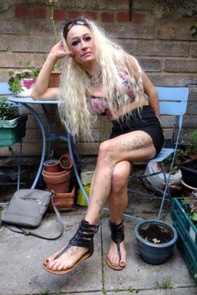 Mature Bristol Escort with leg tattoos