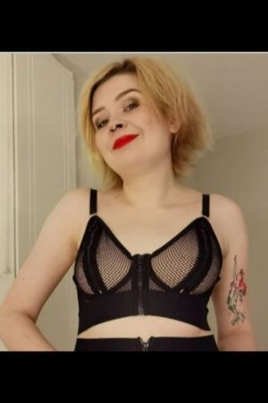 punky Carlisle companion with mermaid tattoo