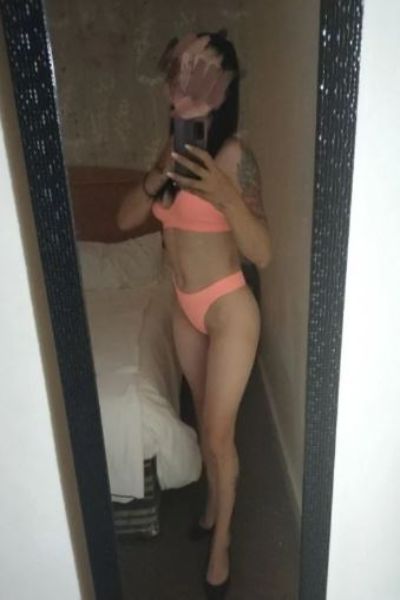 Tattooed Coventry escort taking a selfie