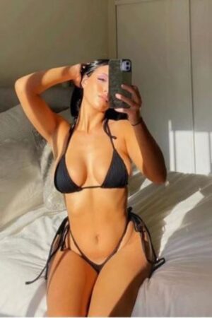Outcall busty Crawley escort in black bikini