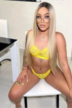 tattooed Gloucester escort in yellow lace