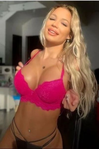 exotic blonde Middlesbrough escort showing cleavage