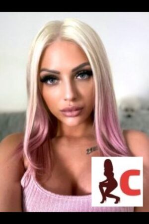 sexy blonde Waterford escort with pink flicks in her hair