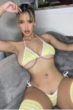 curvy sexy escort in small yellow bikini