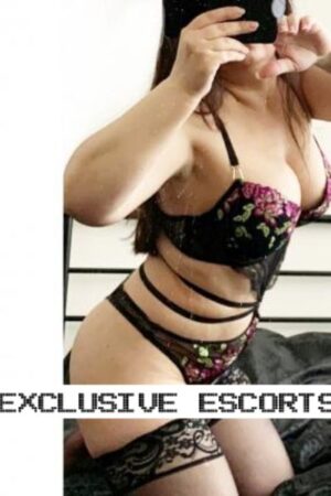Brunette Essex escort in floral lingerie