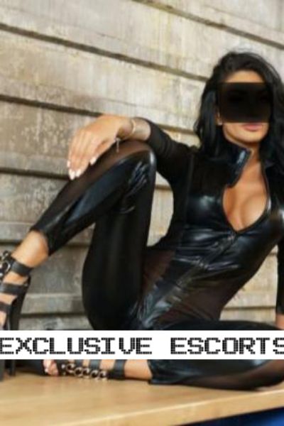 exotic Surrey escort in black patent leather