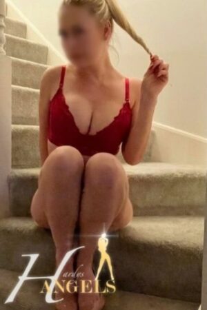 blonde Bournemouth escort playing with her hair