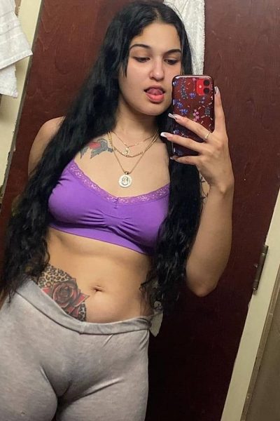 Cheap Rate Cork Escort in a small purple top