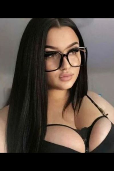 Busty Beeston Escort wearing glasses