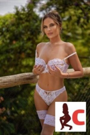 Sexy Tipperary escort cupping her breasts