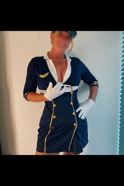 Mature Swansea Escort in a pilots outfit