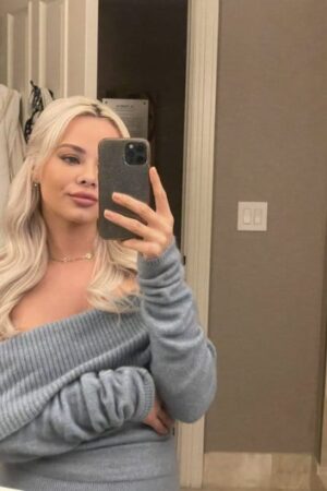 Cute Blonde London Escort takes a selfie