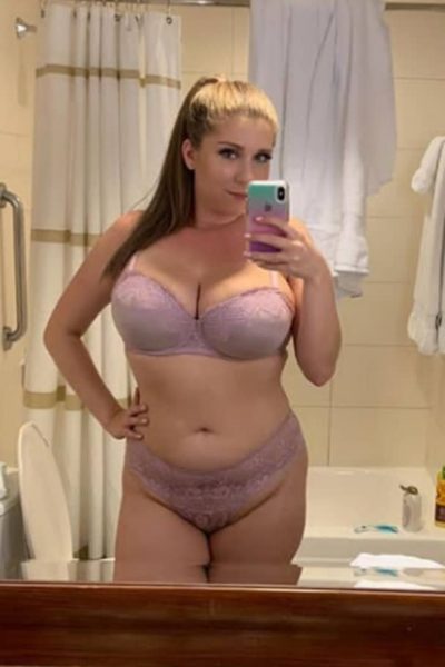 Curvy Busty Manchester Escort taking a selfie