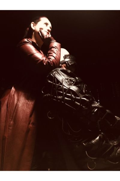 Lady Amber with a tied up gimp