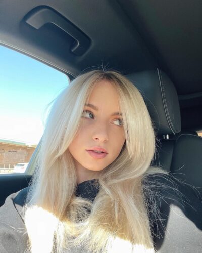 Casy Young Blonde Dublin Escort in the car