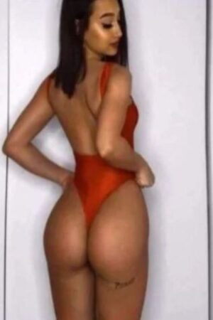 Maya Doncaster Party Girl showing her peachy tanned bum