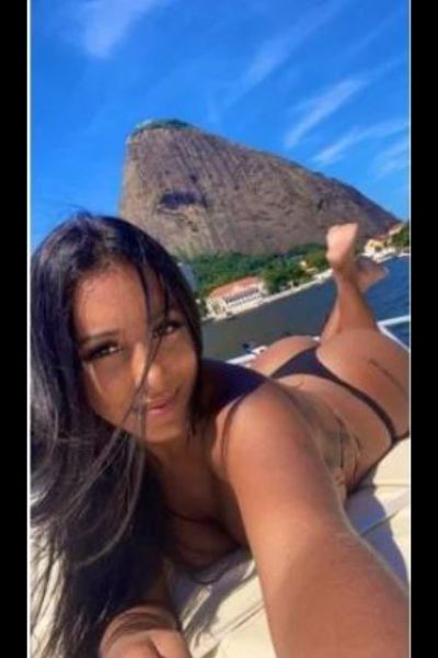 Brazilian Escort in Gloucester shows off her tan