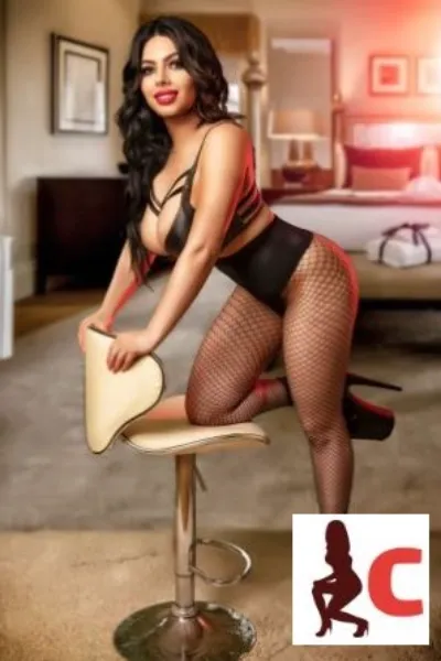 Sexy Ruby in black lingerie and fishnets