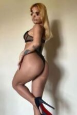 Independent Airdrie Escort showing her bum