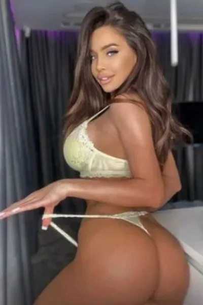 Brunette East Ayrshire Escort in a small yellow thong