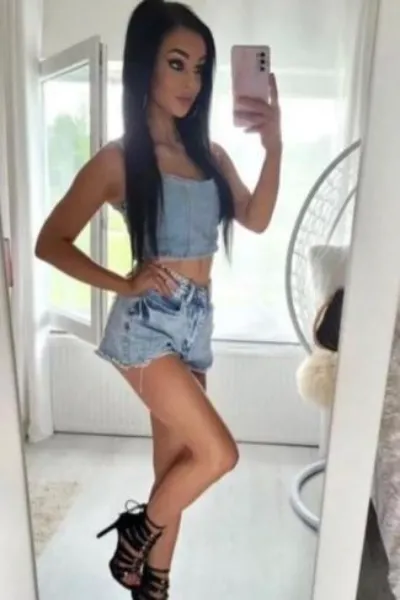 Sabryna Newmarket Escort in a denim outfit