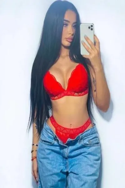 Anissa Teen Winchester Escort in red lingerie and unbuttoned jeans