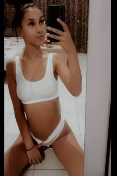 Latina Escort in Perth in white lingerie