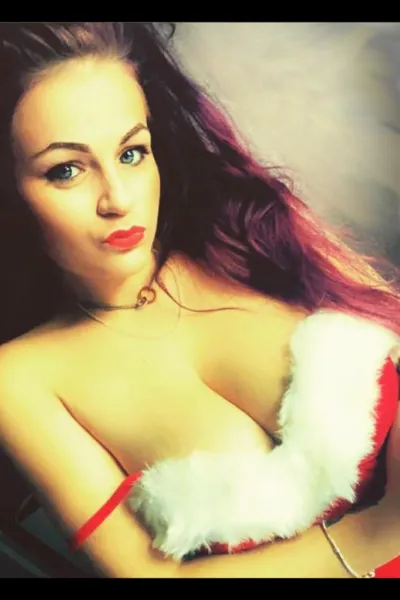 discreet london escort in a santa outfit