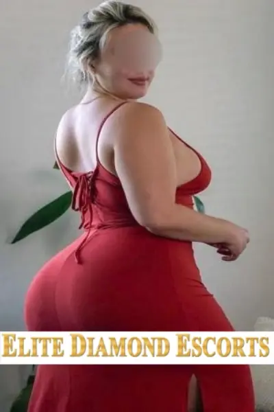 Emma Busty Nottingham Escort in a red dress