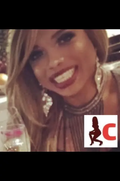 Smiling ebony TV escort