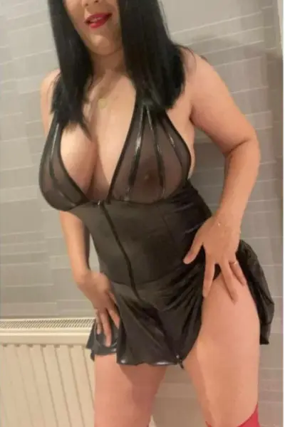 Busty Leith Escort in sheer black bodice