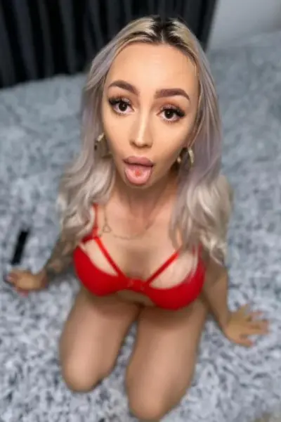 Julya Eh3 Escort sticking tongue out