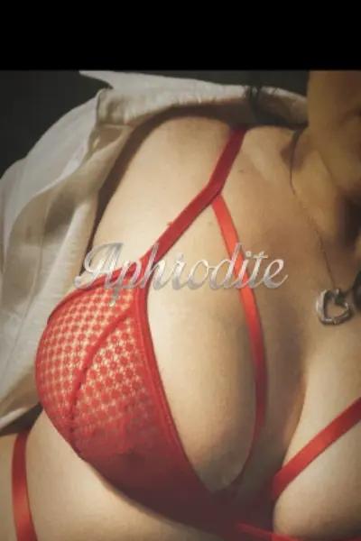 Brandy Cardiff Escort showing breasts