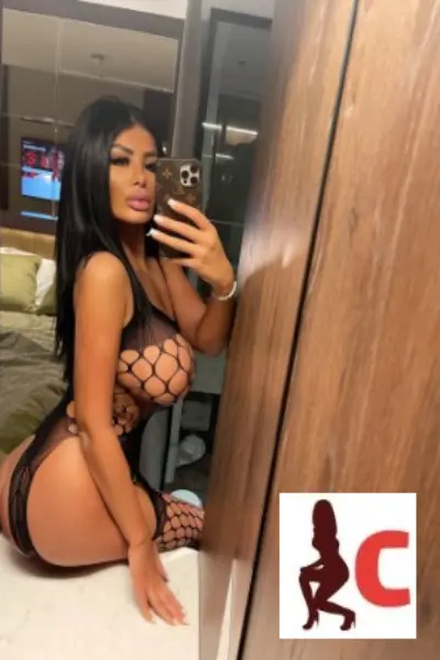 Tanned dark haired Dublin 4 escort taking a selfie