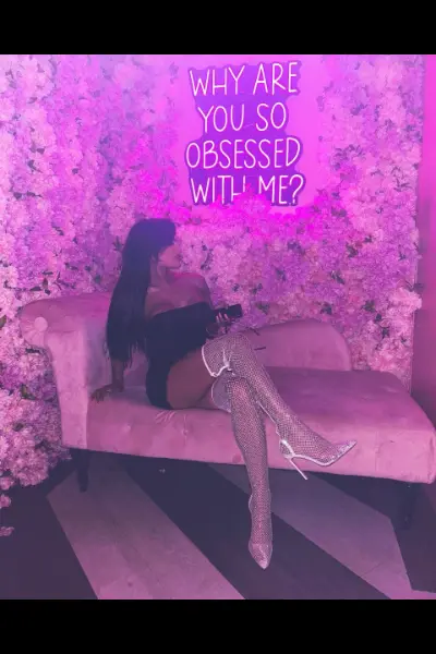 TS escort in shimmering white boots