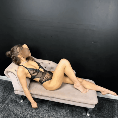 Brunette Sheffield escort laid on the settee