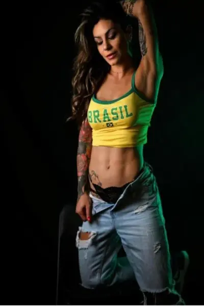 Malvern escort wearing a Brazil top