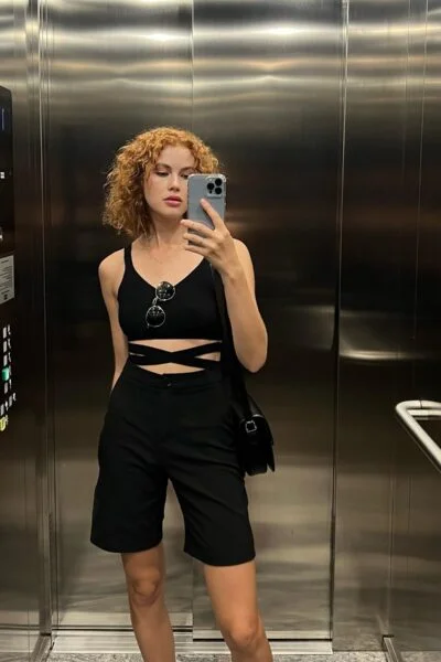 Dublin escort taking a selfie in a lift