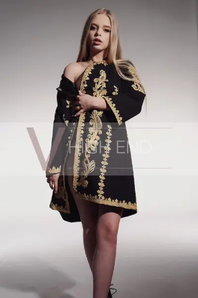 Young blonde Kensington escort in a unusual outfit