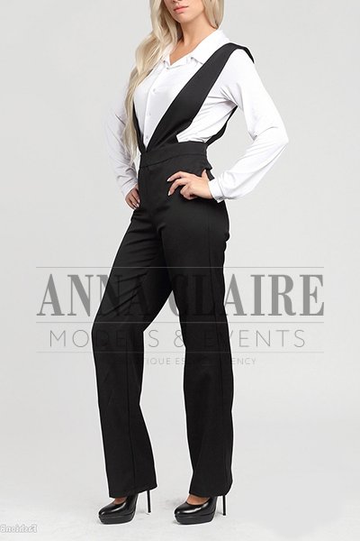 Blonde escort in a suit