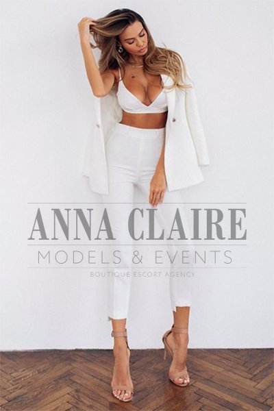 Tall and busty brunette escort