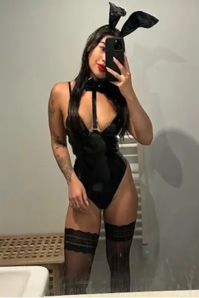 Little Bruna in a PVC black bunny outfit