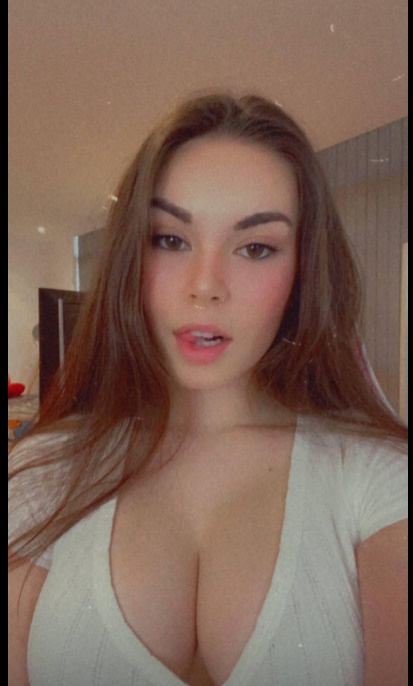 Brunette and busty Belfast escort