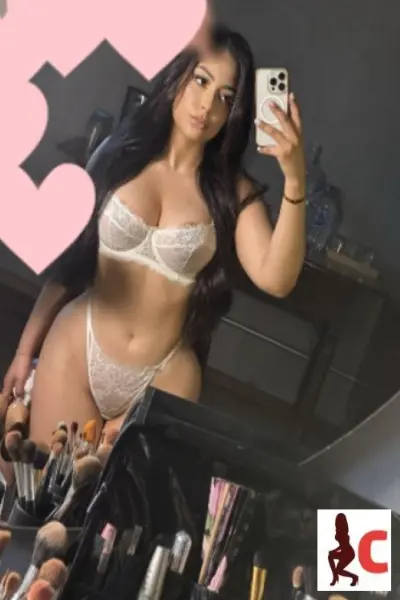 Busty escort taking a selfie