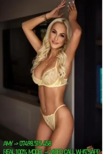 Blonde Hammersmith escort in yellow lingerie
