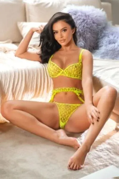 Brunette London escort in yellow lingerie