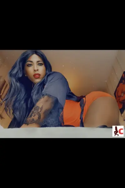 TV escort in orange dress