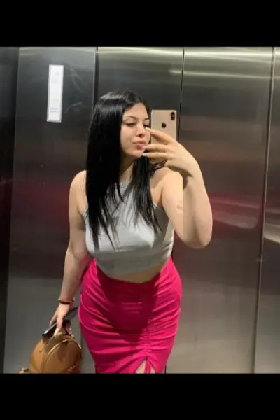 Birmingham escort taking a selfie in a lift
