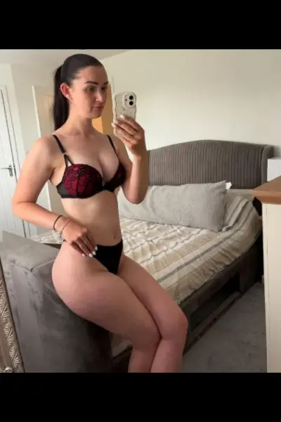 Tall Stockbridge escort taking a selfie in lingerie