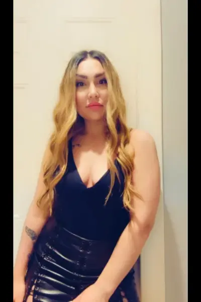 Curly Blonde haired Escort